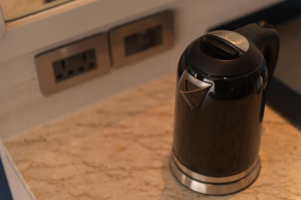 Seabed Grand Hotel Phuket - Sha Extra Plus Kültér fotó A kettle