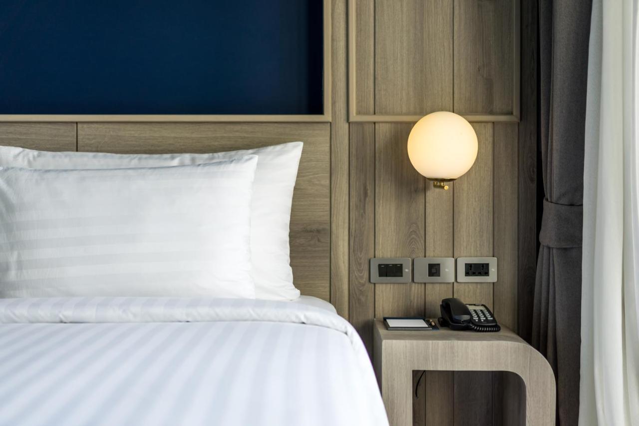 Seabed Grand Hotel Phuket - Sha Extra Plus Kültér fotó A wall-mounted light